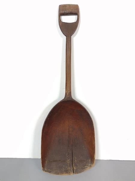 antique wood shovel