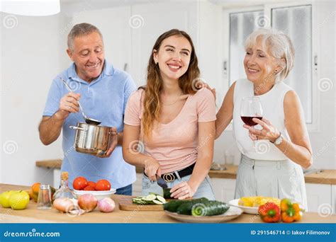 Happy Family of Three Preparing Lunch Together in Modern Kitchen Stock ...