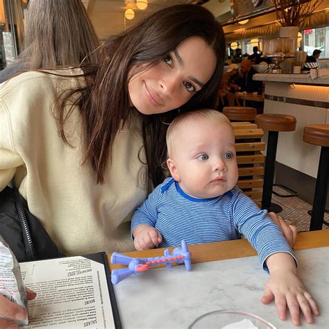 Emily Ratajkowski slammed for nude photos in bathtub with son
