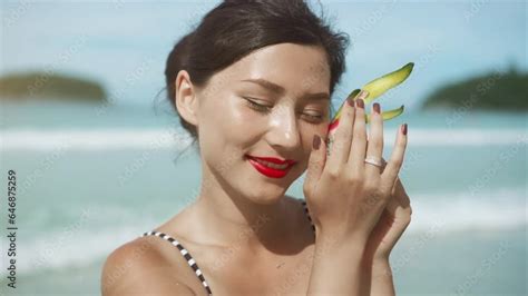 beautiful pretty asian woman  pinup bikini holding dragon fruit