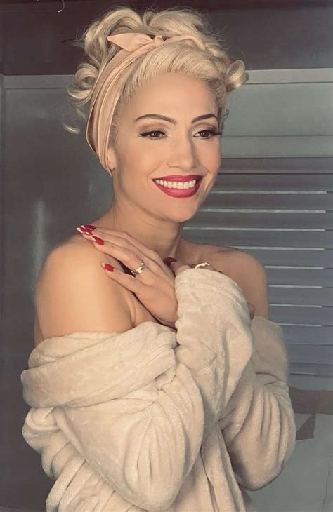 Jennifer Lopez Shares Selfies of Her Platinum Blonde Hair for 'Kiss of