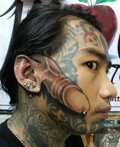 20 Crazy Tattoos That These People Would Regret Immediately (Photo Gallery)