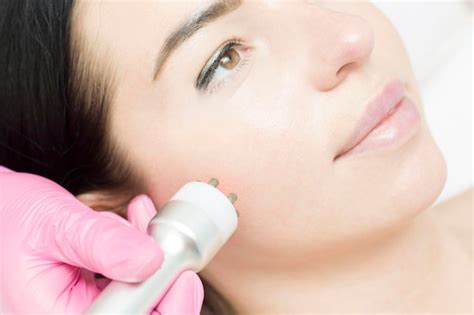 Premium Photo | A young woman is lying on the rflifting procedure for ...
