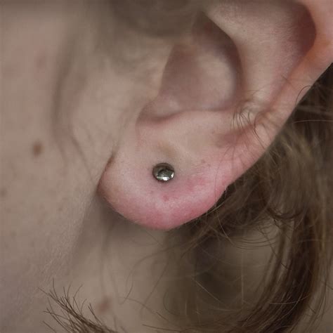 disk threadless  piercing day studio