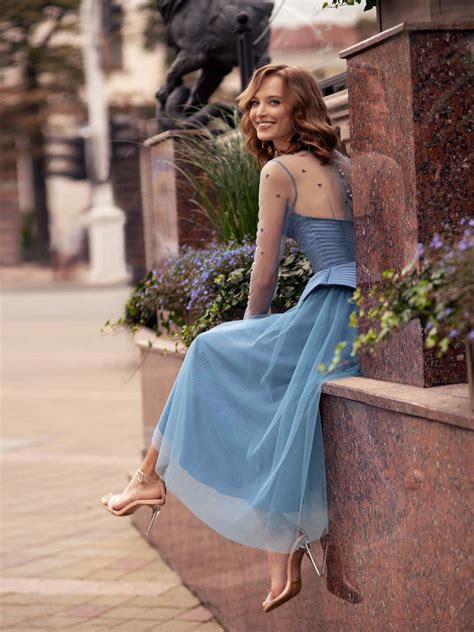 Formal evening gown with sleeves and structured bodice