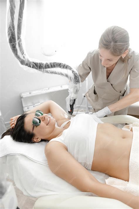 Premium Photo | Painless underarm waxing hair removal by laser waxing