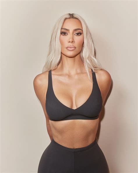 Kim Kardashian stuns as she shows off her bare boobs in see-through