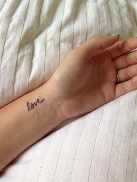My little wrist tattoo of love in my Mimi's handwriting. Got it with my