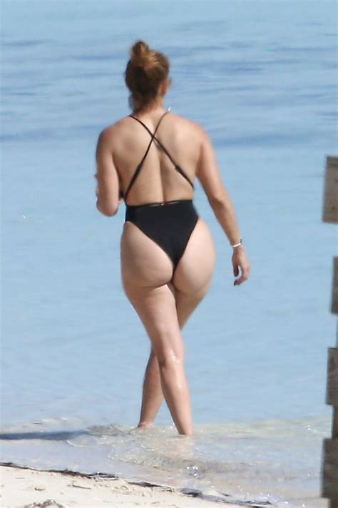 JENNIFER LOPEZ in Swimsuit Paddle-boarding in Turks and Caicos 01/06