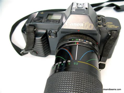 Canon T70 SLR 35mm Film Camera w Zoom 210mm Lens