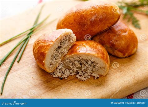 Russian Pirozhki, Baked Patties Or Pies On Basket Royalty-Free Stock ...
