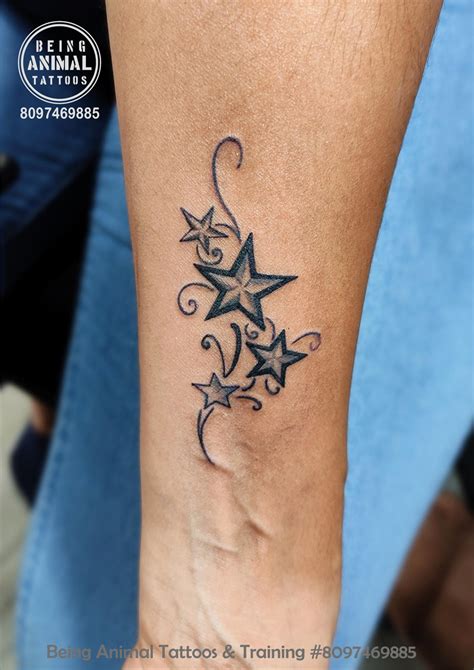 Stars with filigree tattoo on hand for lady client by Samarveera2008 on