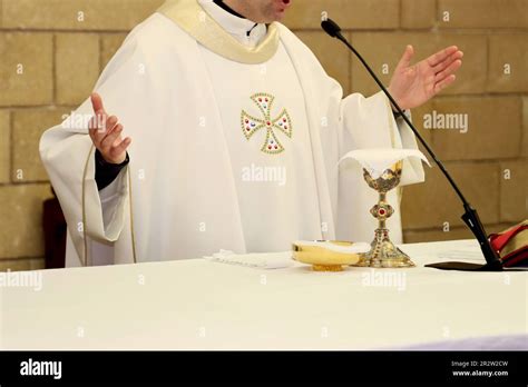 Priest celebrates mass in a Catholic church. Catholicism Stock Photo ...