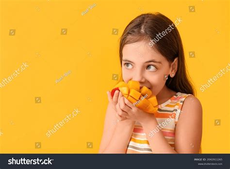 Girl Eats Mango Stock Photos and Pictures - 3,650 Images | Shutterstock