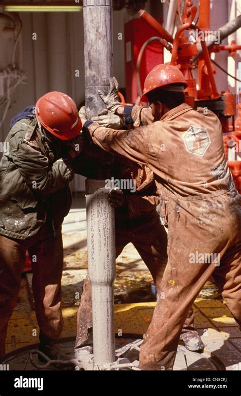 roughneck action  drill pipe   rig floor   offshore