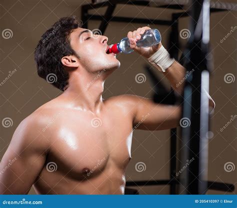 Thirsty Man Drinking Water in Sports Gym Stock Image - Image of ...