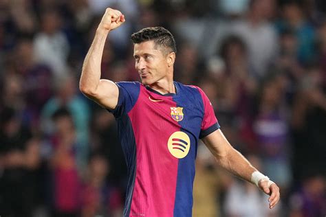 robert lewandowski offers barcelona  pay cut    financial