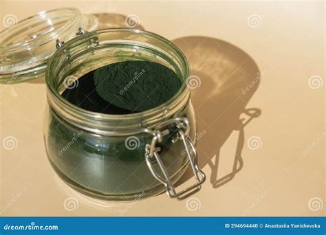 organic blue green algae spirulina powder food  glass jar health