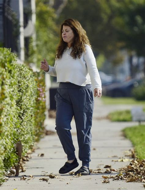 Yasmine Bleeth is spotted on a rare outing with husband Paul Cerrito in