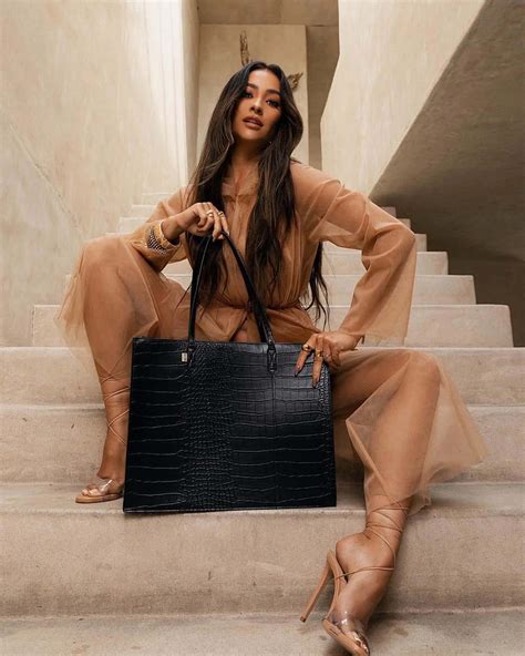 Download Shay Mitchell Elegant Staircase Pose Wallpaper | Wallpapers.com