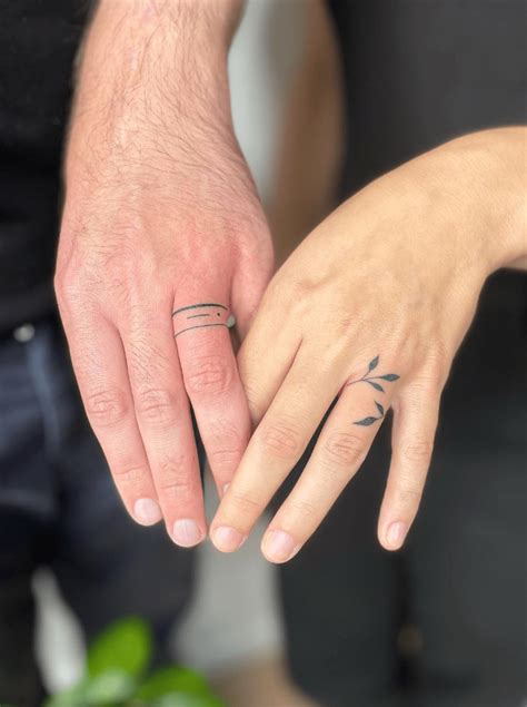 beautiful wedding ring tattoos   traditional couples couple