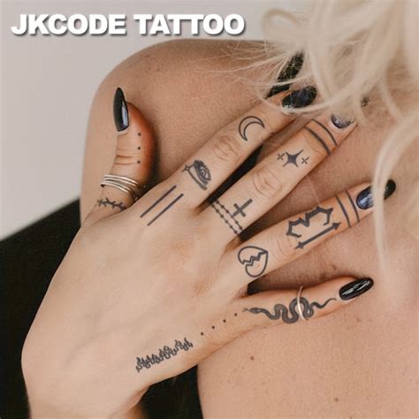 Gothic finger tattoos | Orangetattooshop.com