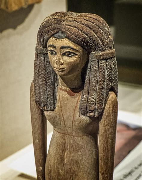Closeup of wooden figurine of a woman Egypt Middle Kingdom 12th Dynasty