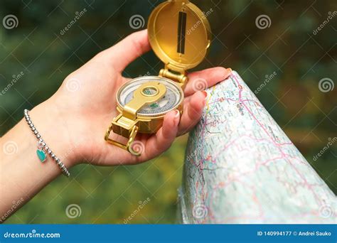 Female Hand Holds Compass and Map Stock Image - Image of compass, young ...