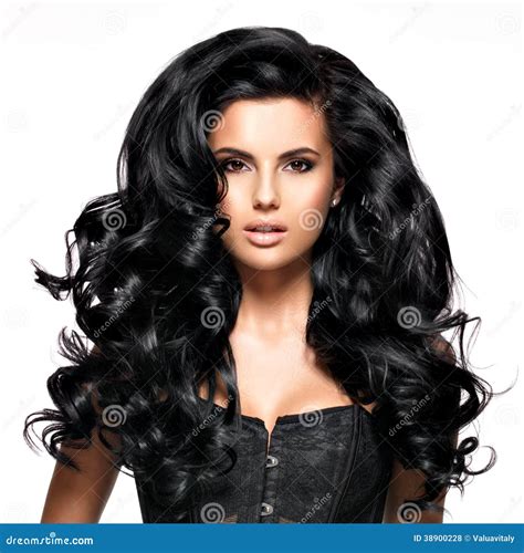 Mujer Morena Hermosa Con El Pelo Negro Largo Foto de archivo - Imagen