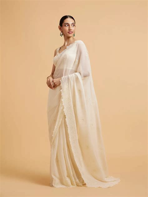 buy enchanting dark cream organza saree   india  mohey saree