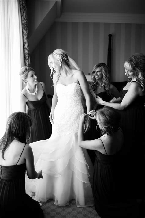 Bride Getting Ready in Strapless Dress with Bridesmaids