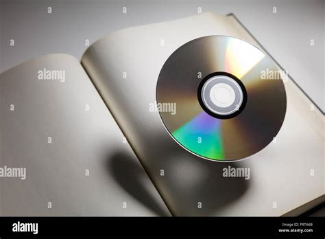 book  dvd disk  dark shadow education concept stock photo alamy