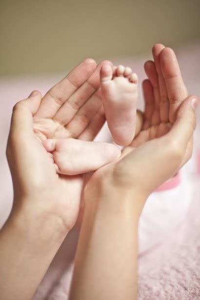 baby legs  mothers arms  stock photo public domain pictures