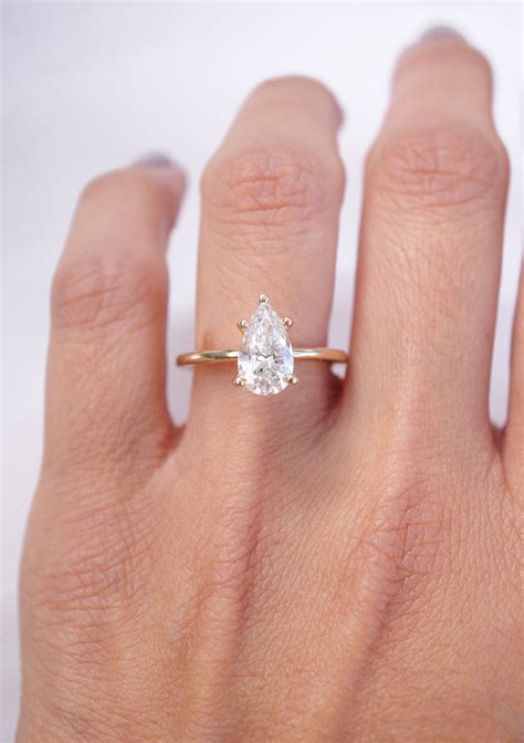pear shaped solitaire diamond engagement ring artofit