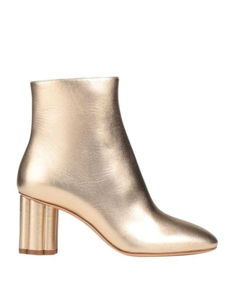 Ferragamo Ankle Boots in Natural | Lyst
