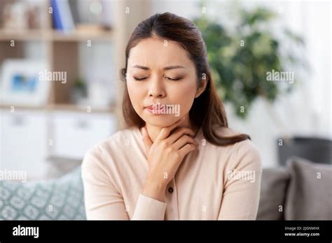Sore throat and asian hi-res stock photography and images - Alamy