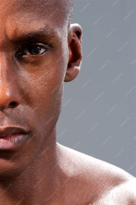 Premium Photo | Half face portrait of serious african american man