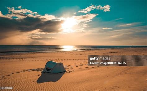 Tent On Sea Beach During Sunrise Jastarnia Poland High-Res Vector ...