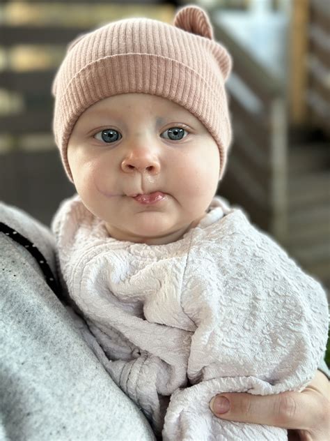 Baby Kayla is on the floor playing with her pink bunny toy — and it’s