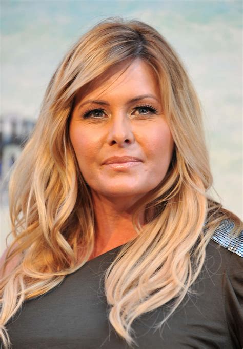 Download Stunning Nicole Eggert Posing for a Photoshoot Wallpaper