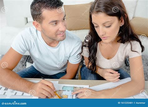 young couple managing finances stock image image  home accounting