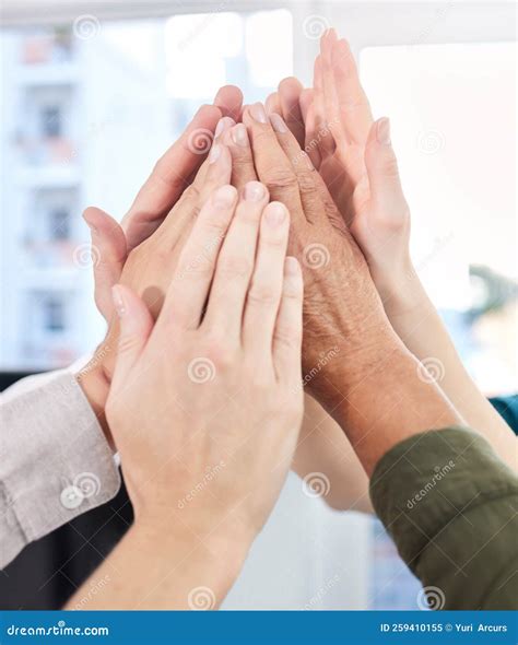 Motivate Your Team Members To Be Their Best. a Group of Colleagues High