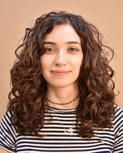 12 Layered Haircuts For Curly Hair That Will Transform Your Curls