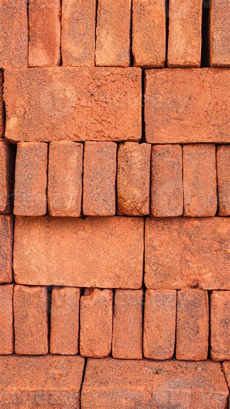 Portrait view of arrangement of solid clay bricks used for construction ...