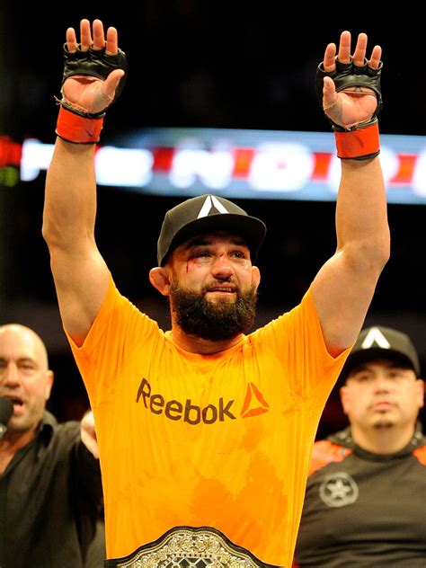 Download Johny Hendricks Waving To The Crowd Wallpaper | Wallpapers.com