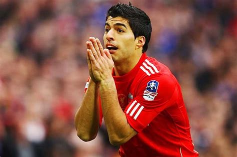 arsenal    consumed  suarez chase sportslenscom