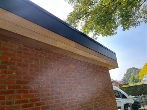 platte dakrenovatie met isolatie en rockpanel afwerking energea solutions