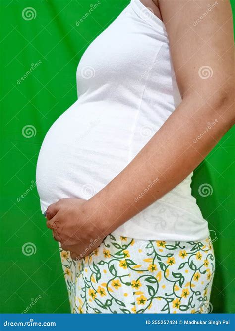 Pregnancy, 7 Month of Gestation, Pregnant Woman, Big Belly Close-up