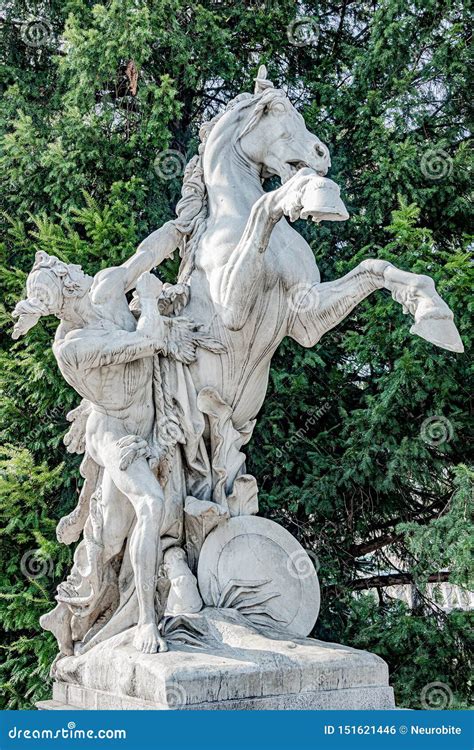 Statue of Young Half Naked Hunter is Trying To Tame a Horse, Located in ...