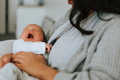 Mother breastfeeding her baby | Royalty free photo - 547161